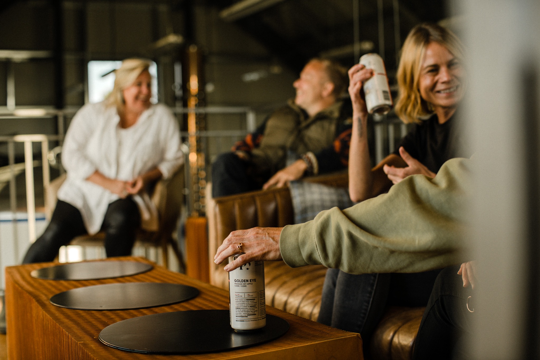 Friends gathering over drinks in an Ontario lounge